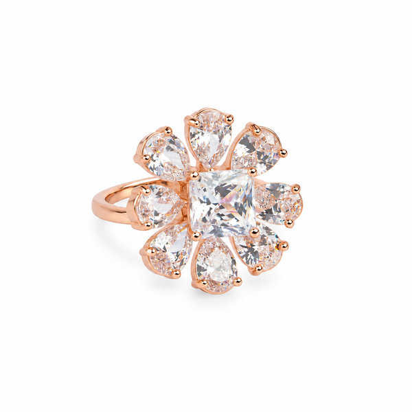 Second angle: Angled view of Rosé Baguette Bloom Ring showing its five stone-set petals and rose-gold band