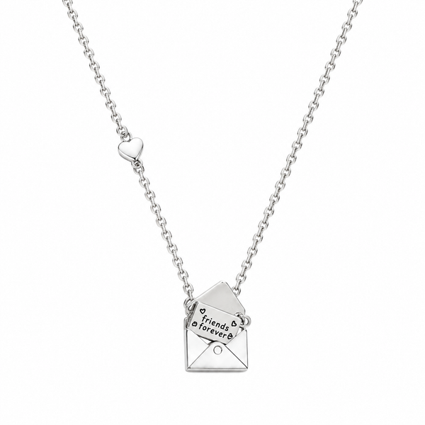 A silver chain necklace featuring a small heart-shaped charm and an open envelope pendant engraved with 'friends forever' and small heart details, shown on a plain white background.
