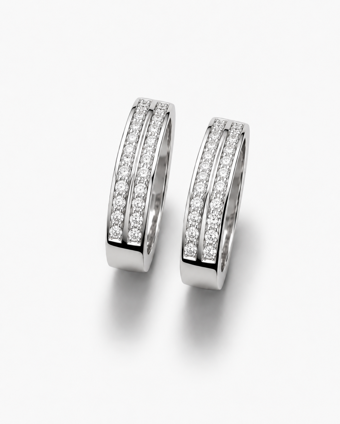 Eternal Bond matching 925 sterling silver couple rings with two rows of clear stones on white