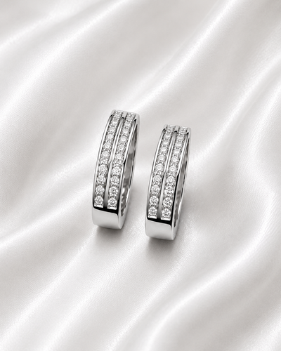 Eternal Bond matching 925 sterling silver couple rings with two rows of clear stones on off white 