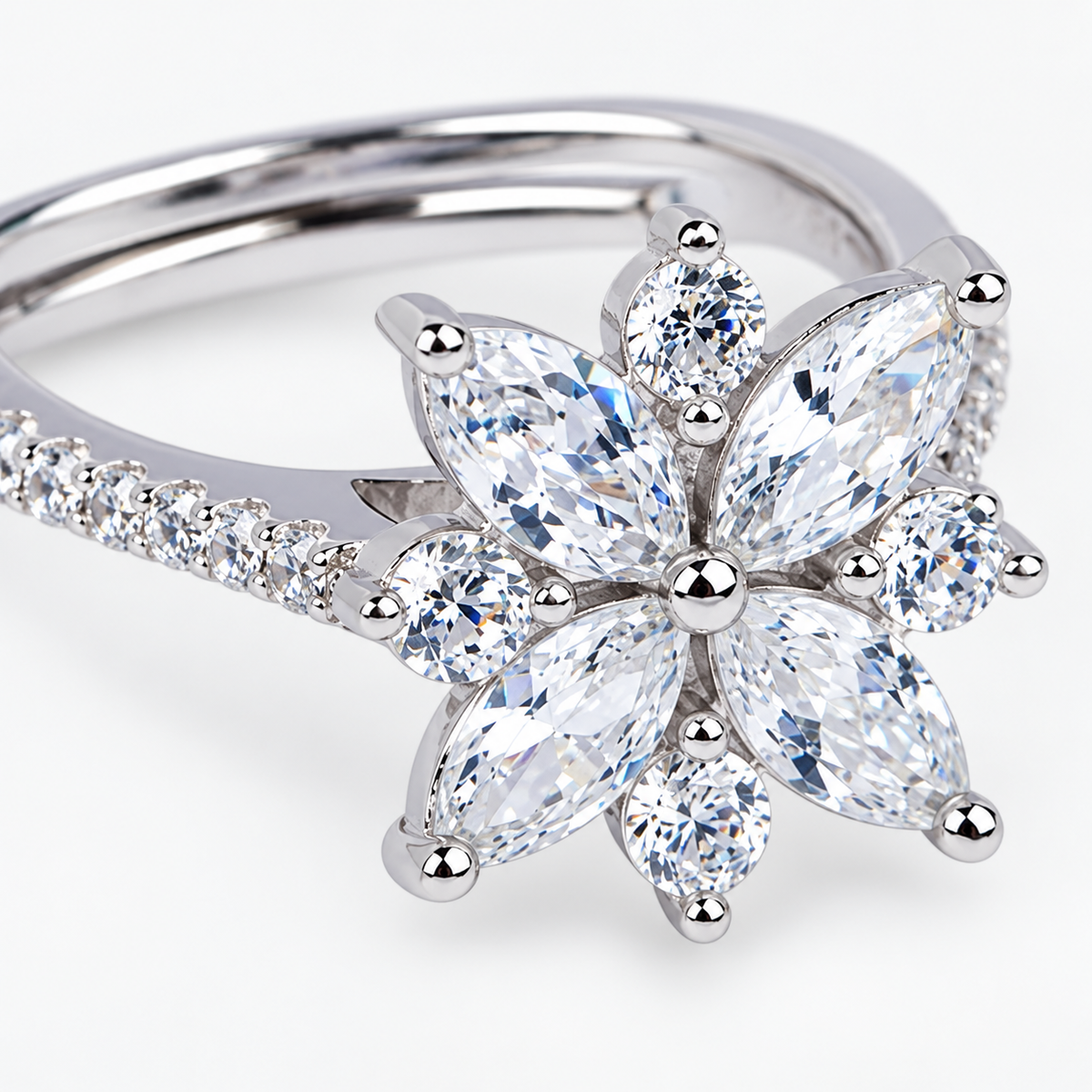 Close-up image: Close-up of marquise-shaped petals and round clear stones on Celeste Bloom silver ring
