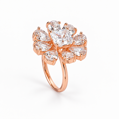 Main image: Aurelia Petal Crown rose-gold 925 silver ring with square and pear-shaped clear stones on white background