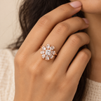 Model image: Woman wearing Rosé Baguette Bloom floral ring showing its actual statement size and fit