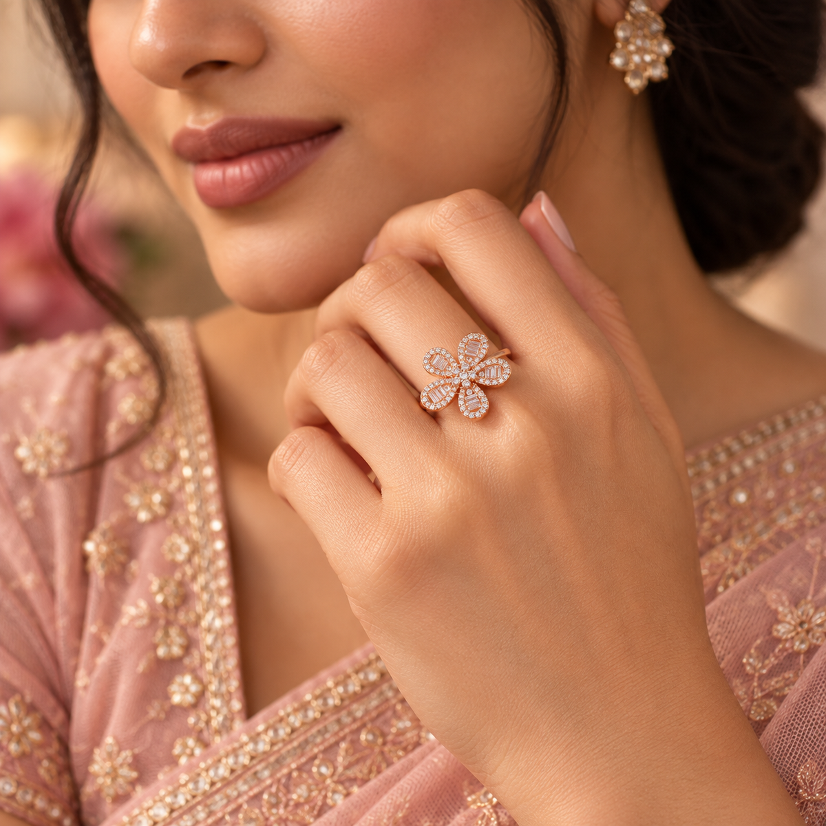 Lifestyle image: Indian woman styling Rosé Baguette Bloom Ring with an elegant blush-pink traditional outfit