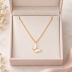 White butterfly pendant necklace presented in an elegant jewellery box
