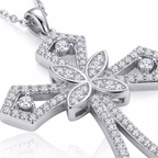 Close-up of ornate filigree cross design on sterling silver necklace