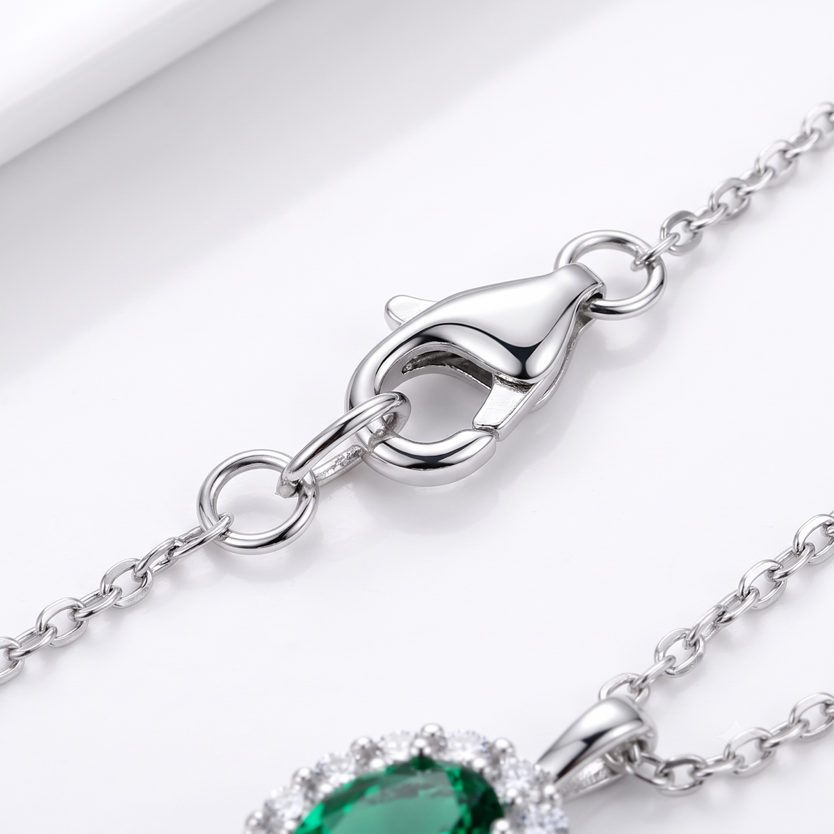 Oval Emerald Halo Necklace