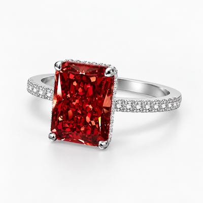 Scarlet Majesty Ring with rectangular red stone and clear pavé band on white background