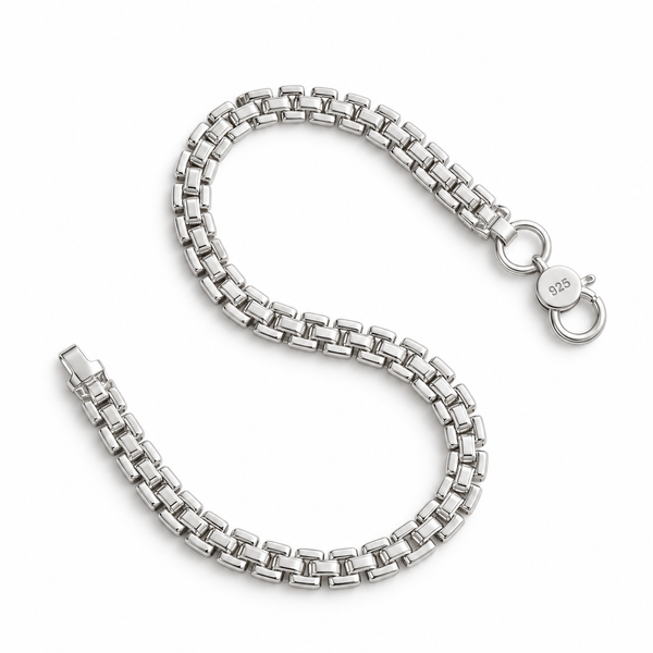 A polished silver-toned metal chain bracelet with a lobster clasp, arranged in an S-shape on a clean white background. The clasp is engraved with '925', indicating sterling silver.